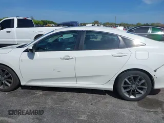 2021 Honda Civic Sedan EX with VIN 2HGFC1F37MH700657, listed as a IAAI auction lot 41633417 with 87,379 mi miles. Bid and sale history available at carsss.com. Image 14.