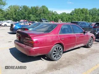 1997 Toyota Camry LE z VIN 4T1BG22K1VU113126, wystawiony jako IAAI lot #42257715 z przebiegiem 177 605 mil mil oraz . Historia ofert i sprzedaży dostępna na DreamBid. Obrazek 4.