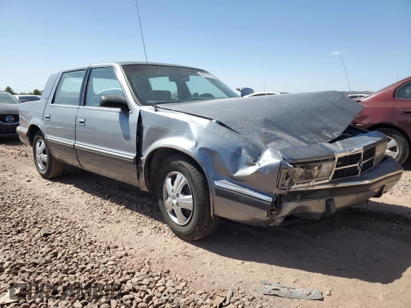 1991 Dodge Dynasty LE z VIN 1B3XC56R9MD115785, wystawiony jako Copart lot #48073715 z przebiegiem 64 483 mil mil oraz Szkoda całkowita • Salvage title. Historia ofert i sprzedaży dostępna na DreamBid. Obrazek 4.