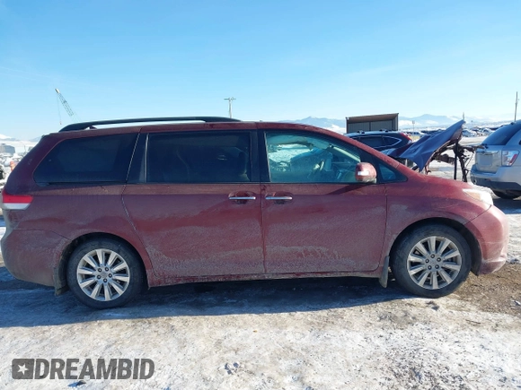 2014 Toyota Sienna XLE with VIN 5TDYK3DC5ES425818, listed as a IAAI auction lot 41421282 with 105,586 mi miles and . Bid and sale history available at DreamBid. Image 13.
