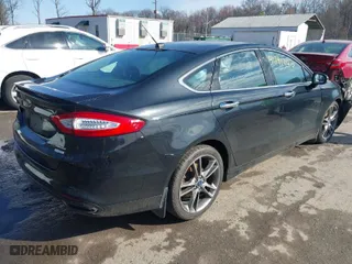 2014 Ford Fusion Titanium with VIN 3FA6P0K9XER119642, listed as a IAAI auction lot 41791340 with 150,777 mi miles. Bid and sale history available at carsss.com. Image 4.
