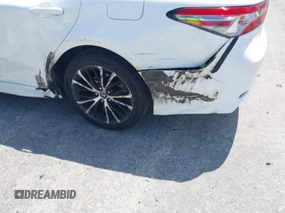 2019 Toyota Camry LE z VIN 4T1B11HK8KU226604, wystawiony jako IAAI lot #42219440 z przebiegiem 53 415 mil mil oraz . Historia ofert i sprzedaży dostępna na DreamBid. Obrazek 6.