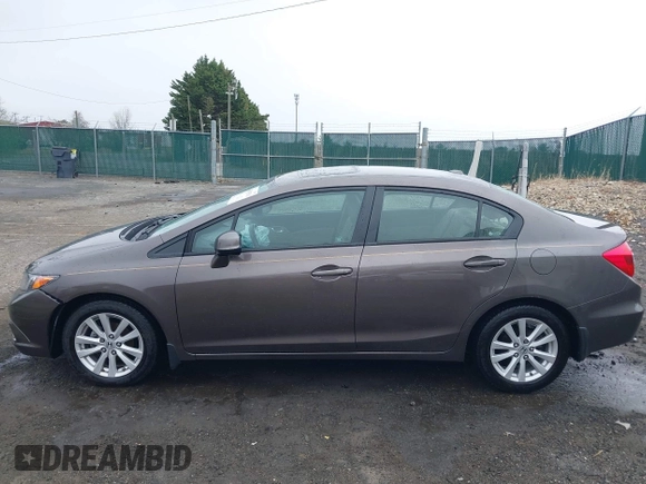 2012 Honda Civic EX-L with VIN 2HGFB2F9XCH505616, listed as a IAAI auction lot 41935511 with 62,298 mi miles and . Bid and sale history available at DreamBid. Image 14.