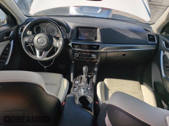 2016 Mazda CX-5 Grand Touring with VIN JM3KE4DY8G0671256, listed as a Copart auction lot 52920975 with 87,822 mi miles and Non Repairable. Bid and sale history available at carsss.com. Image 8.