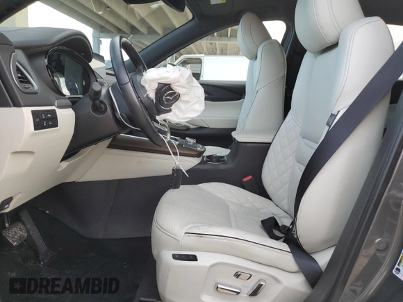 2023 Mazda CX-9 Signature with VIN JM3TCBEYXP0632844, listed as a Copart auction lot 87180834 with 20,415 mi miles and Salvage title. Bid and sale history available at DreamBid. Image 7.