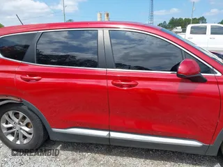 2019 Hyundai Santa Fe SE z VIN 5NMS23AD8KH025141, wystawiony jako IAAI lot #42209919 z przebiegiem 176 172 mil mil oraz . Historia ofert i sprzedaży dostępna na DreamBid. Obrazek 13.
