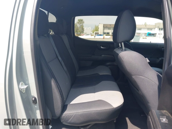 2022 Toyota Tacoma SR5 with VIN 3TMBZ5DN1NM035572, listed as a IAAI auction lot 42083925 with 82,596 mi miles and . Bid and sale history available at DreamBid. Image 8.