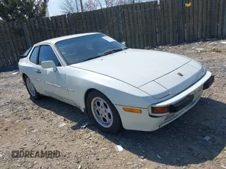 1985 Porsche 944 z VIN WP0AA0949FN455352, wystawiony jako IAAI lot #41841029 z przebiegiem 312 350 mil mil oraz . Historia ofert i sprzedaży dostępna na DreamBid. Obrazek 1.