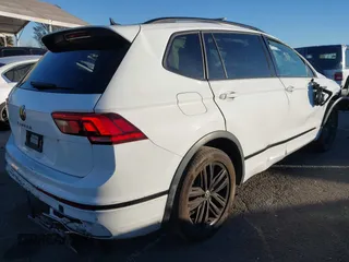 2022 Volkswagen Tiguan SE R-Line Black with VIN 3VVCB7AX1NM022655, listed as a IAAI auction lot 41319977 with 92,860 mi miles and . Bid and sale history available at DreamBid. Image 4.