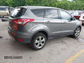 2014 Ford Escape SE z VIN 1FMCU0G98EUC21234, wystawiony jako IAAI lot #42338783 z przebiegiem 124 178 mil mil oraz . Historia ofert i sprzedaży dostępna na DreamBid. Obrazek 4.