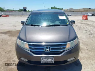 2012 Honda Odyssey Touring with VIN 5FNRL5H93CB109394, listed as a IAAI auction lot 42280018 with 190,412 mi miles and . Bid and sale history available at DreamBid. Image 12.