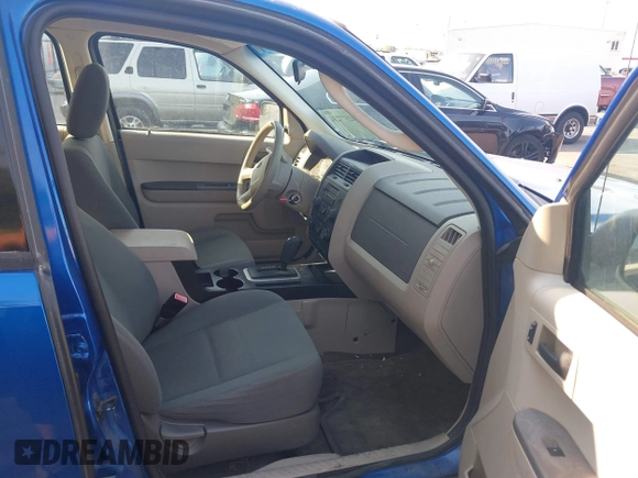 2011 Ford Escape XLS with VIN 1FMCU0C78BKC16059, listed as a IAAI auction lot 42577234 with 210,890 mi miles and . Bid and sale history available at DreamBid. Image 5.