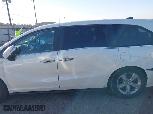2019 Honda Odyssey EX-L z VIN 5FNRL6H76KB083005, wystawiony jako IAAI lot #41589181 z przebiegiem 27 633 mil mil oraz . Historia ofert i sprzedaży dostępna na DreamBid. Obrazek 14.