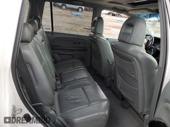 2005 Honda Pilot EX-L z VIN 5FNYF18505B042748, wystawiony jako Copart lot #56696285 z przebiegiem 181 638 mil mil oraz Szkoda całkowita • Salvage title. Historia ofert i sprzedaży dostępna na DreamBid. Obrazek 10.