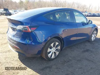 2021 Tesla Model Y Long Range with VIN 5YJYGDEE8MF293230, listed as a IAAI auction lot 41744033 with 56,797 mi miles and . Bid and sale history available at DreamBid. Image 4.