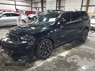 2023 Dodge Durango SRT Hellcat Premium z VIN 1C4SDJH90PC596225, wystawiony jako IAAI lot #41600943 z przebiegiem 18 877 mil mil oraz . Historia ofert i sprzedaży dostępna na DreamBid. Obrazek 2.