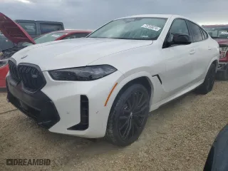 2025 BMW X6 M60i with VIN 5UX43EX07S9X98716, listed as a Copart auction lot 73753074 with 63 mi miles and Salvage Title. Bid and sale history available at carsss.com. Image 1.
