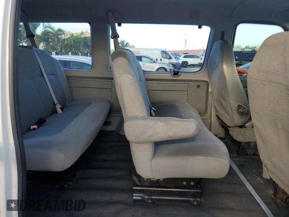2008 Ford Econoline Passenger XL with VIN 1FBSS31L88DA78242, listed as a Copart auction lot 79951474 with 211,663 mi miles and Salvage Title. Bid and sale history available at DreamBid. Image 11.