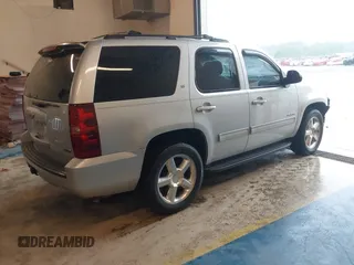 2010 Chevrolet Tahoe LT with VIN 1GNMCBE35AR114622, listed as a IAAI auction lot 41974795 with 248,109 mi miles and . Bid and sale history available at DreamBid. Image 4.