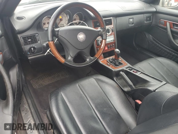2003 Mercedes-Benz SLK 320 with VIN WDBKK65F33F286090, listed as a Copart auction lot 54711385 with 82,300 mi miles and Salvage title. Bid and sale history available at DreamBid. Image 8.