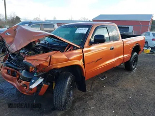 2000 Dodge Dakota SLT with VIN 1B7GG22XXYS610262, listed as a IAAI auction lot 41806744 with 243,650 mi miles and . Bid and sale history available at carsss.com. Image 17.