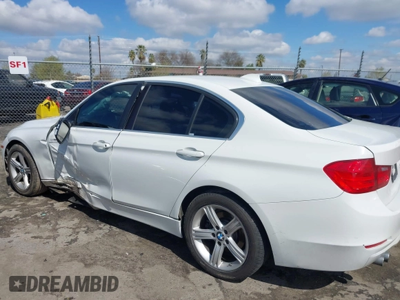 2015 BMW 3 Series 328i with VIN WBA3C1C5XFK117788, listed as a IAAI auction lot 41752178 with 154,030 mi miles and . Bid and sale history available at carsss.com. Image 14.