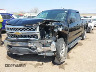 2014 Chevrolet Silverado 1500 LT with VIN 1GCVKREH9EZ282578, listed as a IAAI auction lot 42062801 with 163,158 mi miles and . Bid and sale history available at DreamBid. Image 6.