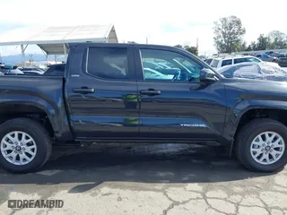 2024 Toyota Tacoma 4WD SR5 with VIN 3TMLB5JN7RM022456, listed as a IAAI auction lot 41430159 with 6,058 mi miles. Bid and sale history available at carsss.com. Image 14.