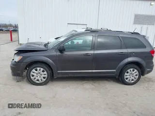 2017 Dodge Journey SE with VIN 3C4PDCABXHT694909, listed as a IAAI auction lot 41640828 with 188,657 mi miles and . Bid and sale history available at DreamBid. Image 14.