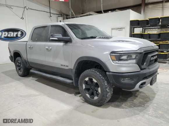 2019 Ram 1500 Rebel with VIN 1C6SRFLT3KN671103, listed as a Copart auction lot 49518485 with 134,232 mi miles and Clean Title. Bid and sale history available at carsss.com. Image 4.