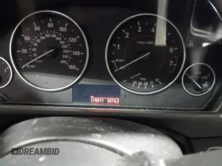 2014 BMW 3 Series 328i xDrive with VIN WBA3B5C5XEP652454, listed as a IAAI auction lot 41949889 with 176,011 mi miles. Bid and sale history available at carsss.com. Image 7.
