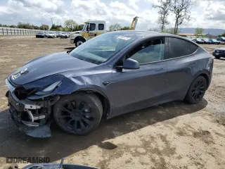 2023 Tesla Model Y Long Range with VIN 7SAYGAEE6PF792081, listed as a Copart auction lot 50937375 with 29,678 mi miles and Salvage Title. Bid and sale history available at carsss.com. Image 1.