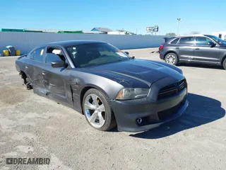2013 Dodge Charger RT Max with VIN 2C3CDXCT4DH580262, listed as a IAAI auction lot 41252672 with 103,276 mi miles. Bid and sale history available at carsss.com. Image 1.
