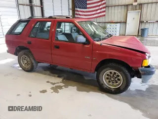 1994 Isuzu Rodeo LS z VIN 4S2CY58V2R4356432, wystawiony jako Copart lot #60352494 z przebiegiem 171 914 mil mil oraz Szkody całkowita. Historia ofert i sprzedaży dostępna na DreamBid. Obrazek 4.