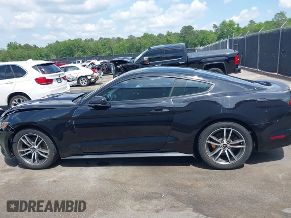 2016 Ford Mustang EcoBoost z VIN 1FA6P8TH2G5276754, wystawiony jako IAAI lot #42157727 z przebiegiem 71 174 mil mil oraz . Historia ofert i sprzedaży dostępna na DreamBid. Obrazek 14.