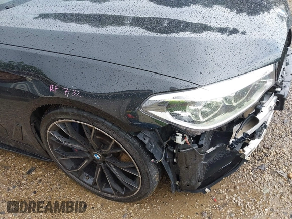 2018 BMW 5 Series M550i xDrive with VIN WBAJB9C5XJB286923, listed as a IAAI auction lot 42527301 with 76,923 mi miles and . Bid and sale history available at DreamBid. Image 20.