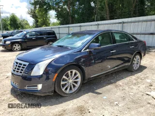 2015 Cadillac XTS Luxury with VIN 2G61M5S38F9173165, listed as a Copart auction lot 62940775 with 103,993 mi miles and Salvage title. Bid and sale history available at DreamBid. Image 1.