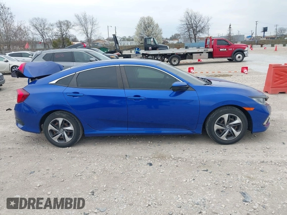 2020 Honda Civic LX with VIN 2HGFC2F69LH550744, listed as a IAAI auction lot 42079594 with 34,724 mi miles and . Bid and sale history available at DreamBid. Image 13.