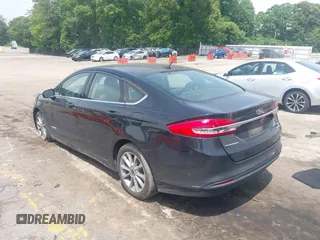 2017 Ford Fusion Hybrid SE with VIN 3FA6P0LU4HR358501, listed as a IAAI auction lot 42287032 with 165,456 mi miles and . Bid and sale history available at DreamBid. Image 3.