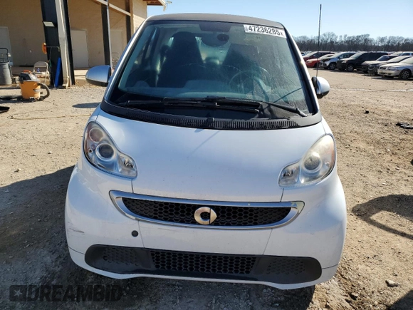 2015 Smart fortwo Passion z VIN WMEEJ3BA0FK812519, wystawiony jako Copart lot #47236285 z przebiegiem 122 139 mil mil oraz Szkody całkowita. Historia ofert i sprzedaży dostępna na DreamBid. Obrazek 5.