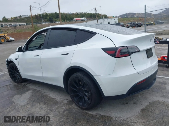 2020 Tesla Model Y Long Range with VIN 5YJYGDEE2LF022484, listed as a IAAI auction lot 41798662 with 108,978 mi miles and . Bid and sale history available at DreamBid. Image 3.