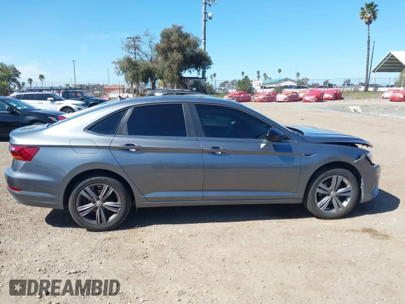 2019 Volkswagen Jetta S z VIN 3VWC57BU9KM223304, wystawiony jako IAAI lot #41722624 z przebiegiem 111 751 mil mil oraz . Historia ofert i sprzedaży dostępna na DreamBid. Obrazek 13.