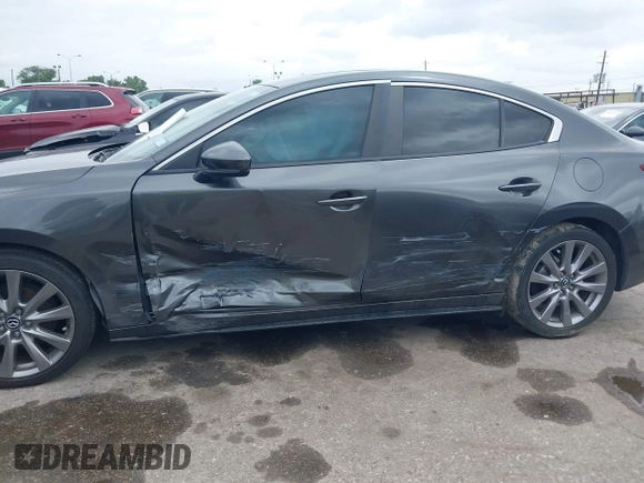 2021 Mazda 3 Preferred with VIN 3MZBPACL6MM252531, listed as a IAAI auction lot 42145811 with 35,869 mi miles and . Bid and sale history available at DreamBid. Image 6.