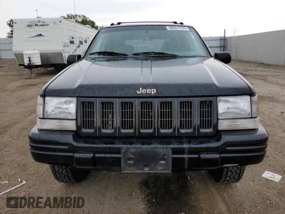 1997 Jeep Grand Cherokee Limited z VIN 1J4GZ78Y8VC586034, wystawiony jako Copart lot #58061705 z przebiegiem 244 355 mil mil oraz Czysty tytuł • Clean title. Historia ofert i sprzedaży dostępna na DreamBid. Obrazek 5.