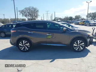 2015 Nissan Murano Platinum z VIN 5N1AZ2MG7FN230347, wystawiony jako IAAI lot #41545220 z przebiegiem 134 435 mil mil oraz . Historia ofert i sprzedaży dostępna na DreamBid. Obrazek 14.