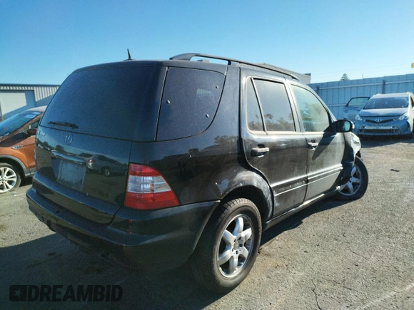2003 Mercedes-Benz M-Class 3.7L with VIN 4JGAB57EX3A445949, listed as a Copart auction lot 74633744 with 223,427 mi miles and Salvage Title. Bid and sale history available at carsss.com. Image 3.