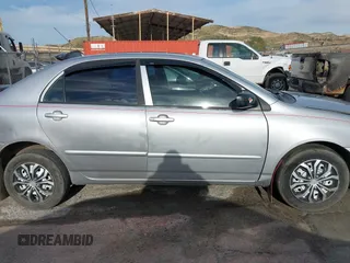 2004 Toyota Corolla CE with VIN 1NXBR32E14Z255758, listed as a IAAI auction lot 41901809 with 156,408 mi miles and . Bid and sale history available at DreamBid. Image 14.