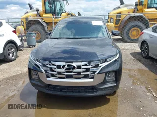 2022 Hyundai Santa Cruz SEL with VIN 5NTJBDAE2NH008015, listed as a IAAI auction lot 42232891 with 31,450 mi miles and . Bid and sale history available at DreamBid. Image 12.