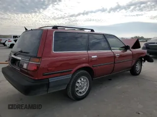 1988 Toyota Camry z VIN JT2SV21W9J0191632, wystawiony jako Copart lot #82323554 z przebiegiem 145 961 mil mil oraz Szkoda całkowita • Salvage title. Historia ofert i sprzedaży dostępna na DreamBid. Obrazek 3.