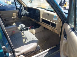 1995 Jeep Cherokee Sport with VIN 1J4FJ68S7SL631078, listed as a IAAI auction lot 42408148 with 190,765 mi miles and . Bid and sale history available at DreamBid. Image 5.